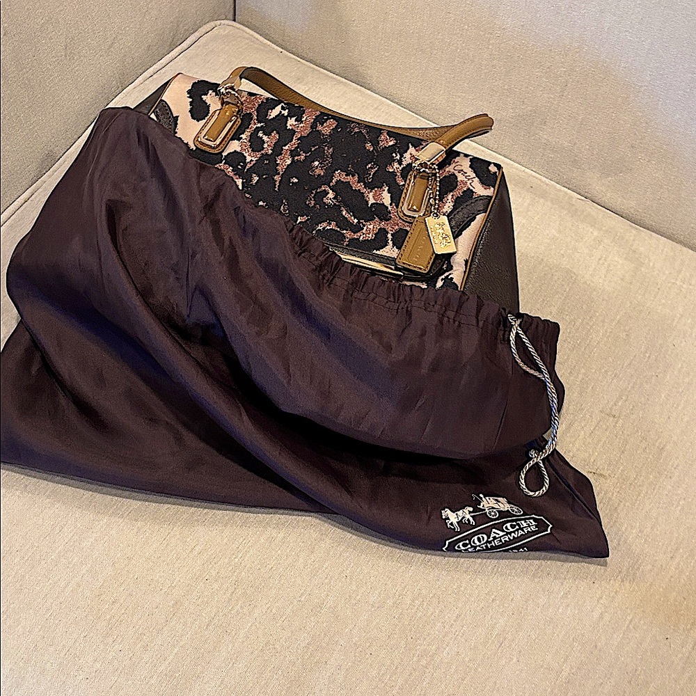 Animal print Coach leather trimmed bag  great size and shape perfect condition